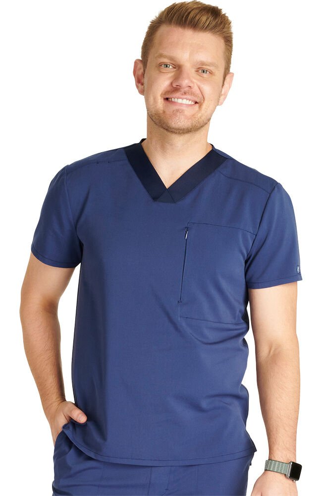 Scrubs caballeros azul marino con tecnología integrada de tejido, ayuda a combatir el mal olor y la acumulación de humedad, para que tu scrub luzca y se sienta tan profesional como tú.